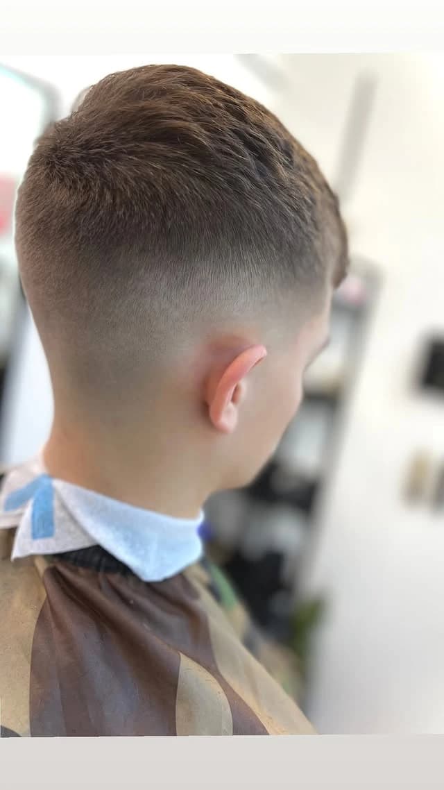 Textured crop with a high skin fade, back view
